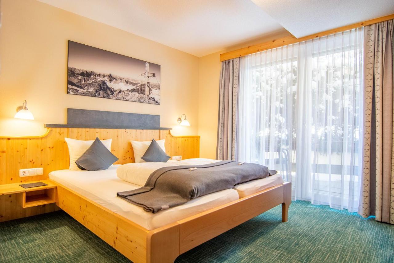 Hotel Garni Alpenhof อิสชเกิล ภายนอก รูปภาพ
